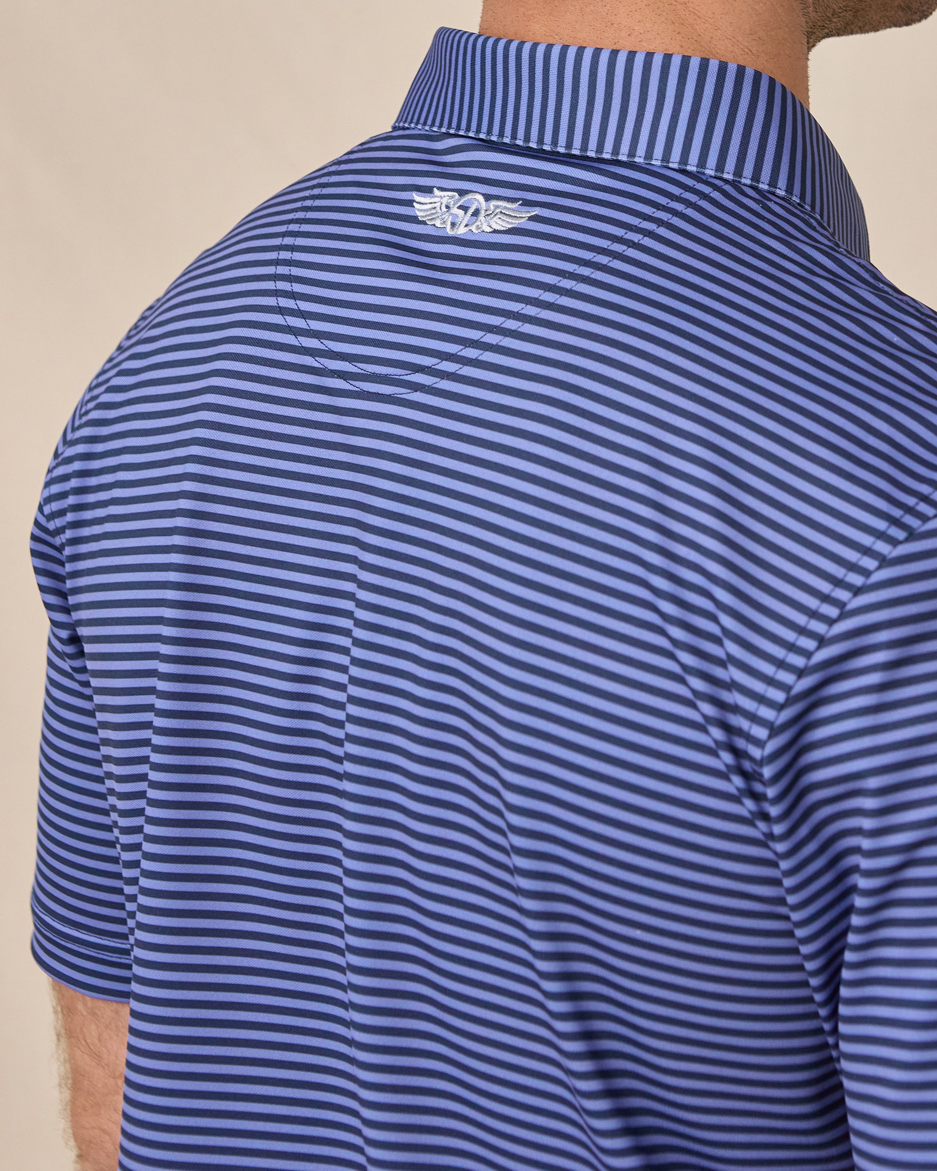 Del Mar Stripe Polo in Tidal Blue, back logo detail close-up