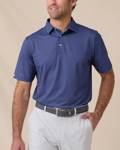Men’s striped tidal blue polo with short sleeves and button placket, paired with silver shorts