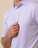Close-up of men’s striped violet polo collar and button placket with clean, minimal design