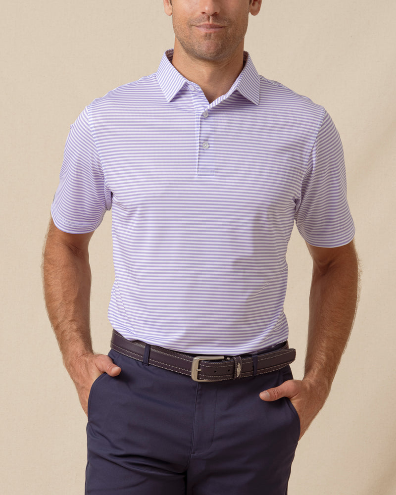 Men’s striped violet polo with short sleeves and button placket, paired with navy shorts