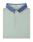 Chorro Polo in Herb featuring a blue contrast collar with white and orange stripe detailing.