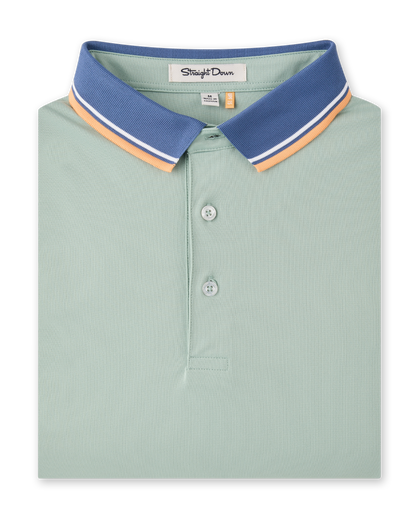 Chorro Polo in Herb featuring a blue contrast collar with white and orange stripe detailing.