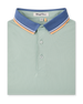 Chorro Polo in Herb featuring a blue contrast collar with white and orange stripe detailing.