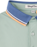 Close-up of the Chorro Polo in Herb highlighting the textured blue collar with white and orange stripe accents.