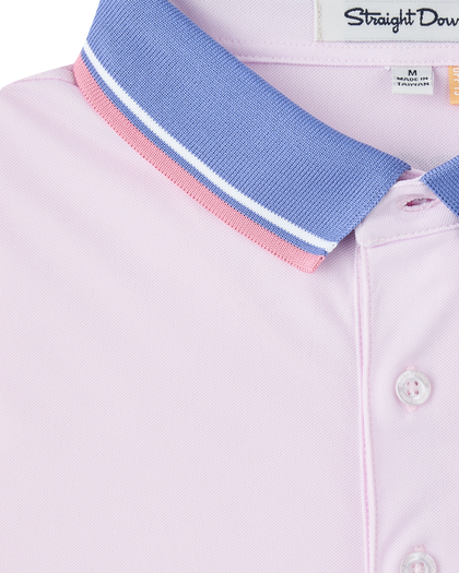 Close-up of the Chorro Polo in Lilac showcasing the contrast blue collar with pink and white tipping