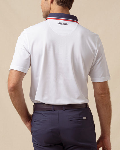 Chorro Polo in White with New Indigo collar and red trim, back model view