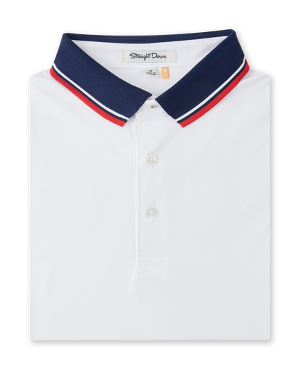 Chorro Polo in White with New Indigo collar and red trim, folded front product view