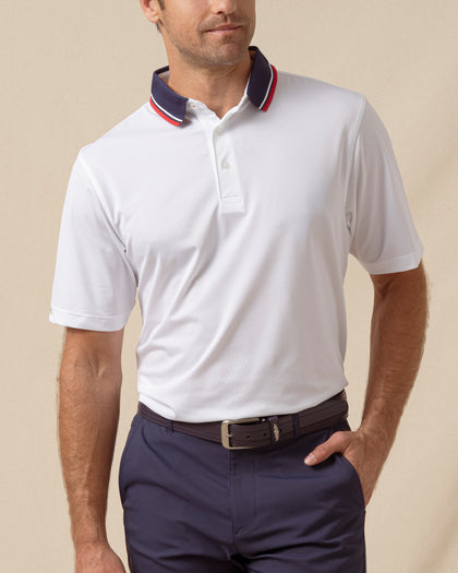 Chorro Polo in White with New Indigo collar and red trim, front model view