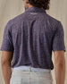 Men's American Muscle Polo in New Indigo, back view on model featuring a navy, burgundy, and sky blue classic car novelty print with Straight Down logo embroidered at the upper back, paired with light gray pants