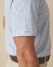 Men's American Muscle Polo in Moonlight, close-up on-model sleeve detail view featuring a navy classic car sketch novelty print with Straight Down woven label at the sleeve hem