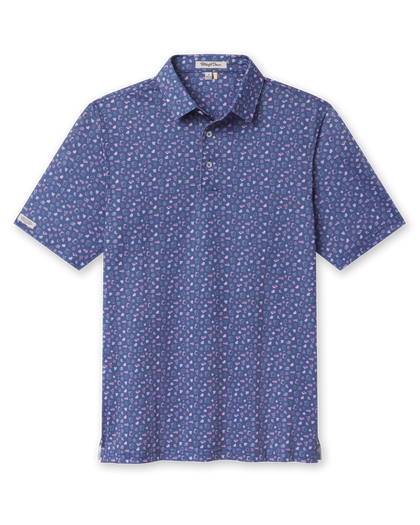 Men's Hold 'Em Polo in Moonlight, front view featuring an allover casino print with playing cards, poker chips, dice, and card suits in pink and white on navy