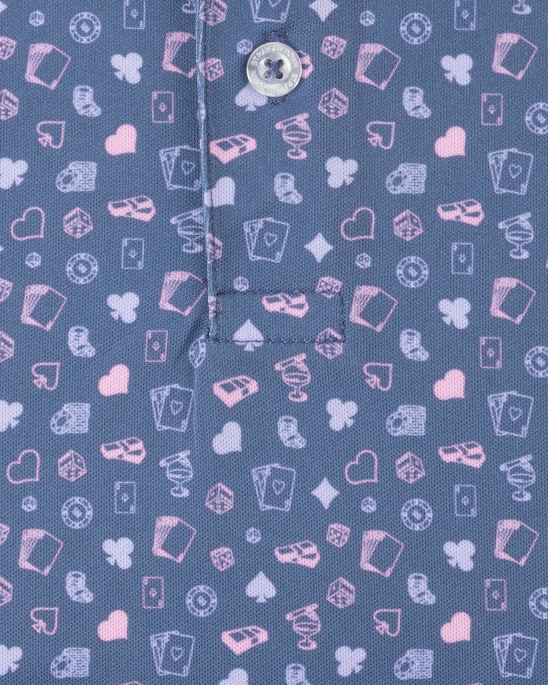 Men's Hold 'Em Polo in Moonlight, close-up fabric detail showing the allover casino print with playing cards, poker chips, dice