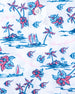 Men's Island Paradise Polo in Cool Blue, close-up front view featuring palm trees, sailboats, hibiscus flowers, and tropical fish and blue on a white body with a Straight Down logo button detail on the placket