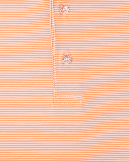 Peninsula Stripe Polo in Cantaloupe, close-up front view highlighting the orange and white fine horizontal stripe fabric and Straight Down branded button hardware detail