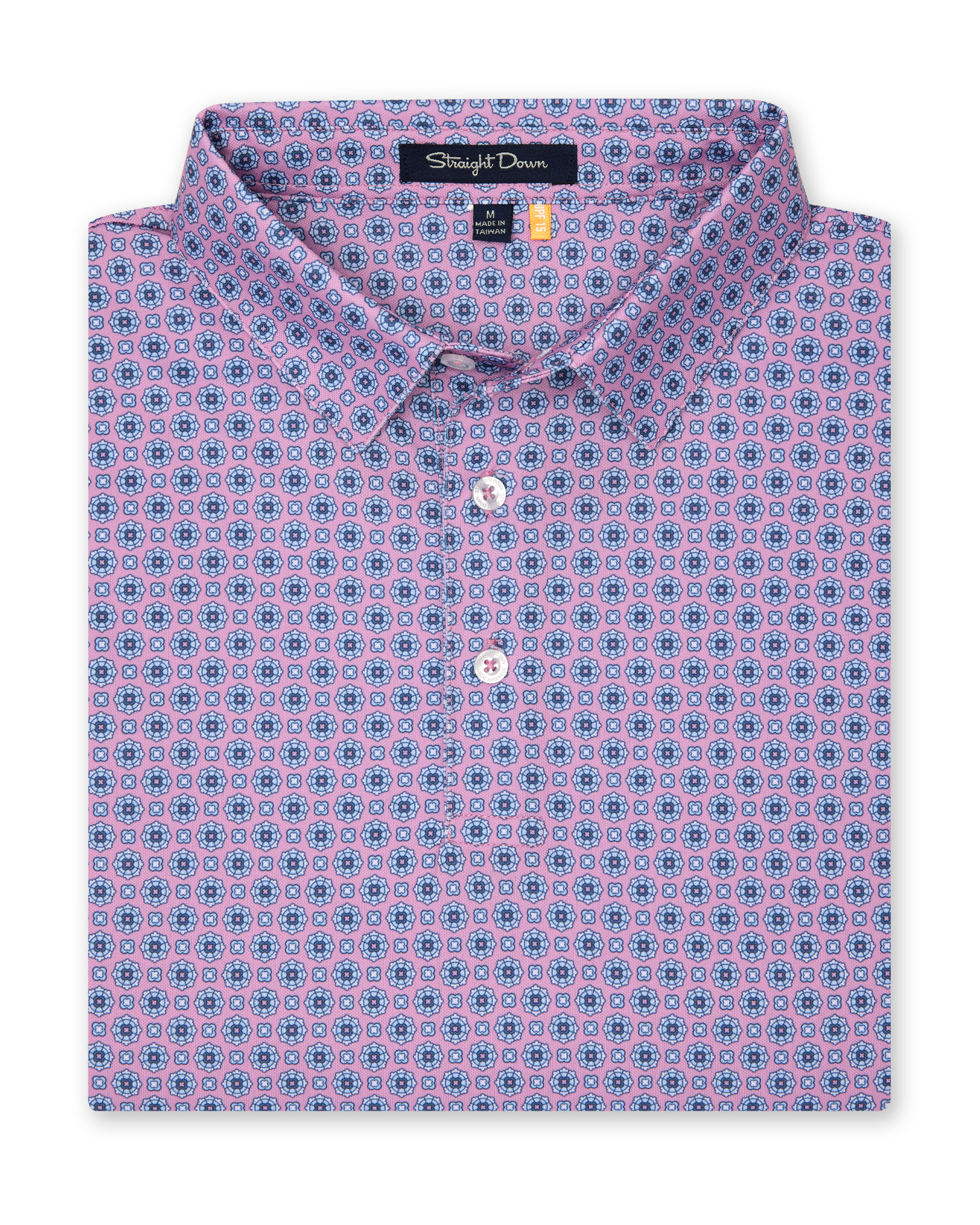 Men’s pink golf polo with blue geometric print, folded with button placket