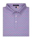 Men’s pink golf polo with blue geometric print, folded with button placket