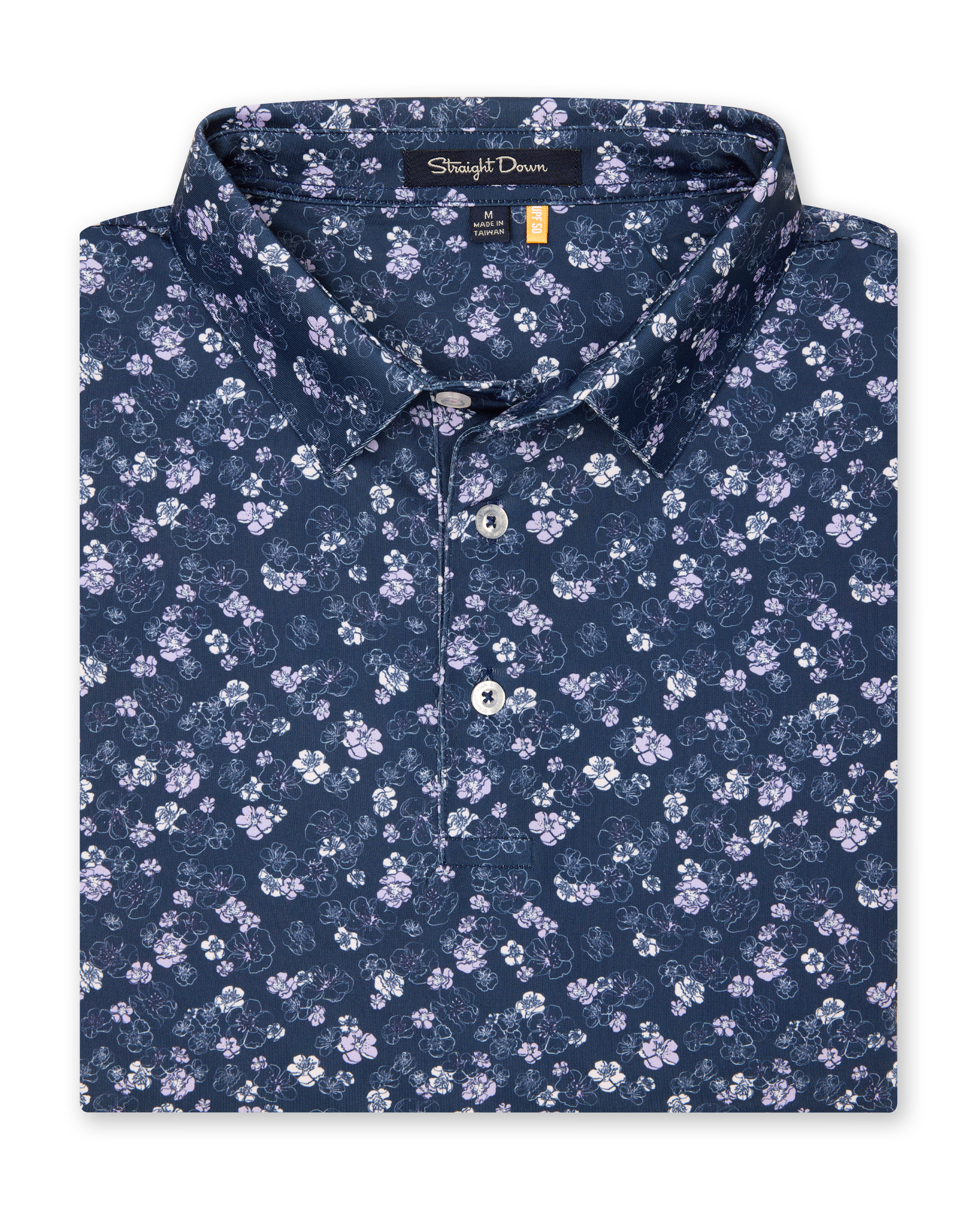 Men's Dogwood Polo in New Indigo, folded flat lay front view featuring an allover floral dogwood blossom print in lavender and white on a navy base