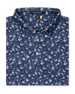 Men's Dogwood Polo in New Indigo, folded flat lay front view featuring an allover floral dogwood blossom print in lavender and white on a navy base