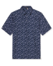Men's Dogwood Polo in New Indigo, flat lay front view featuring a navy short sleeve polo with an all-over scattered floral blossom print in lavender and white
