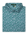 Men's Dogwood Polo in Sage, folded flat lay front view featuring an allover floral dogwood blossom print in lavender and white on a teal green base