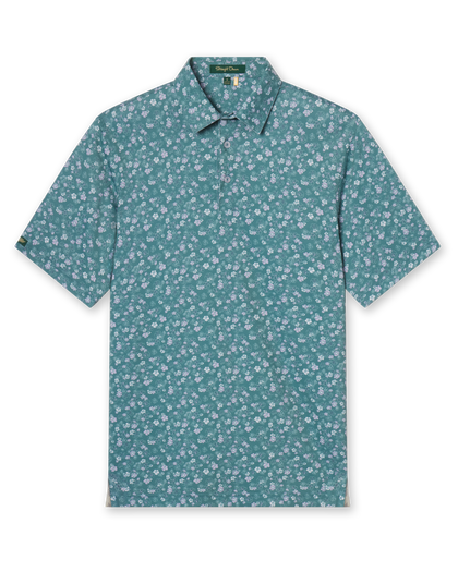 Men's Dogwood Polo in Sage, flat lay front view featuring a sage green base with a scattered white and lavender floral print and Straight Down sleeve tab