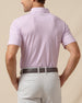 Back view of men’s haze floral print polo with logo detail below the collar