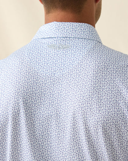 Men's Gin Therapy Polo in Pink Floyd, close-up back neck detail featuring the Straight Down logo embroidered at center back and an allover martini glass print in purple and light blue