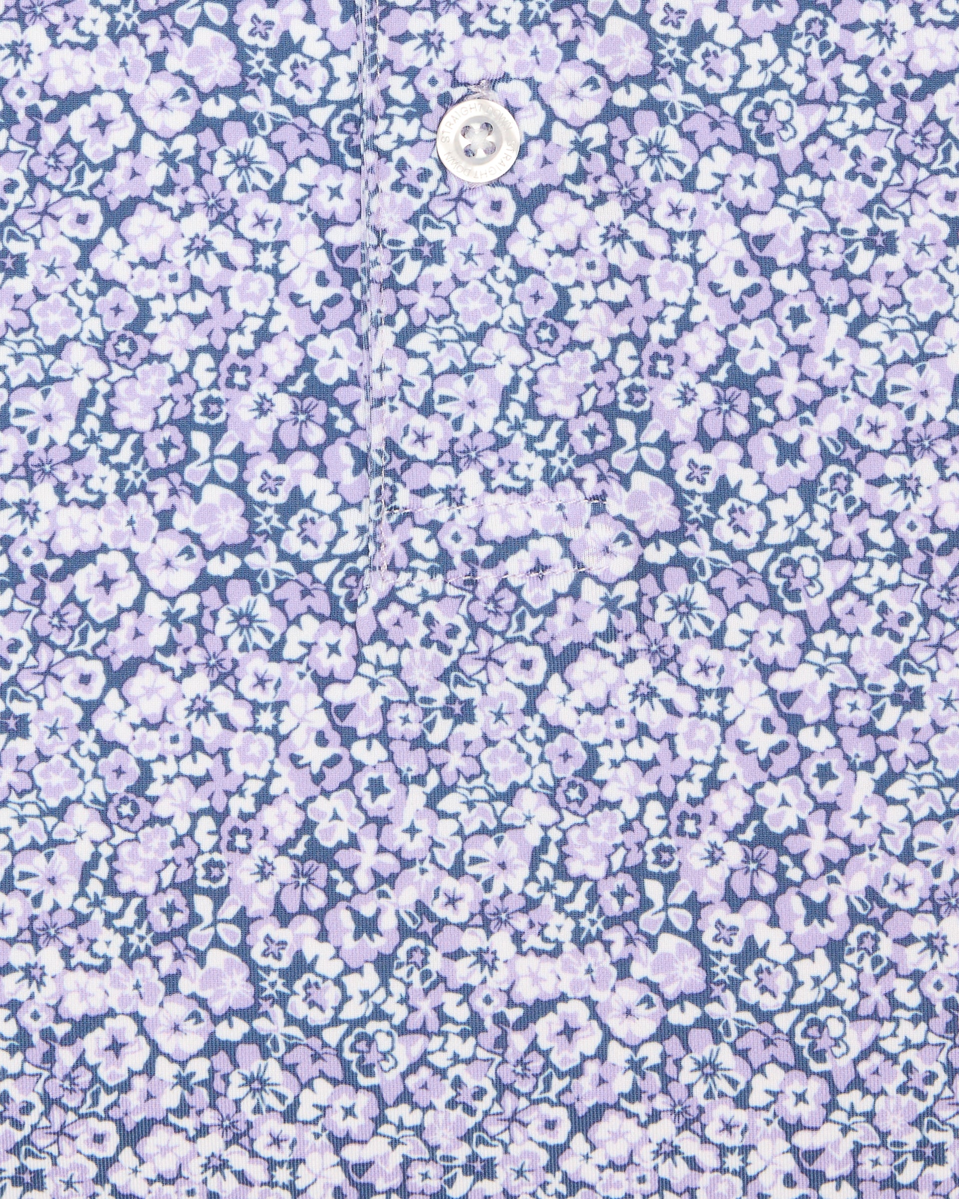 Close-up of men’s light purple floral print polo shirt