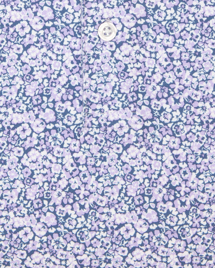 Close-up of men’s light purple floral print polo shirt