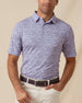 Men’s light purple micro floral print polo shirt styled with light khaki pants and a leather belt