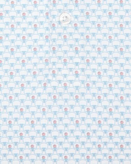 Men's Slam Dunk Polo in Coastal, close-up fabric detail showing the allover basketball hoop and ball print in light blue and pink on white