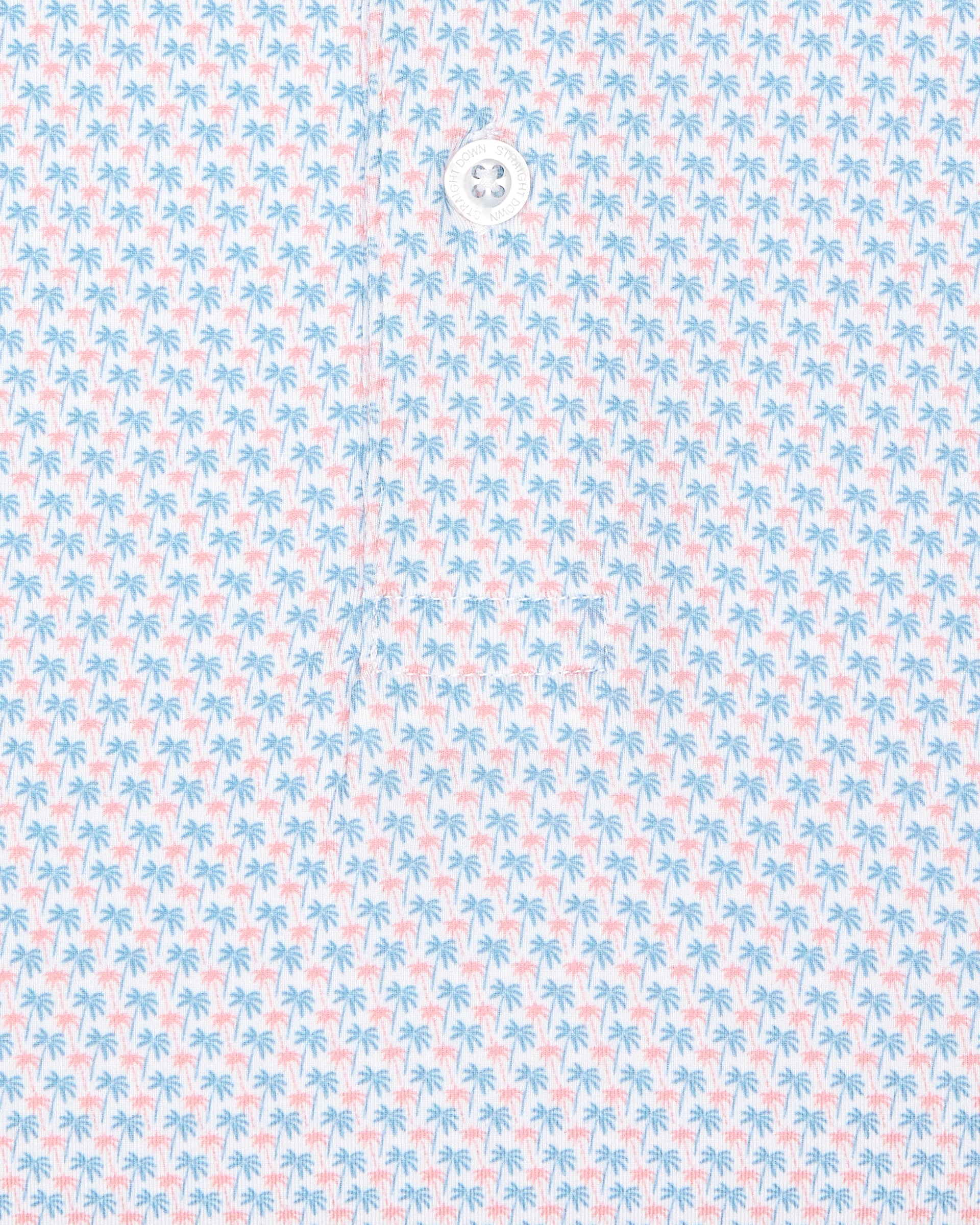 Men's Cocora Polo in Coastal, close-up flat lay fabric detail view highlighting the all-over blue and pink palm tree micro print on a white base