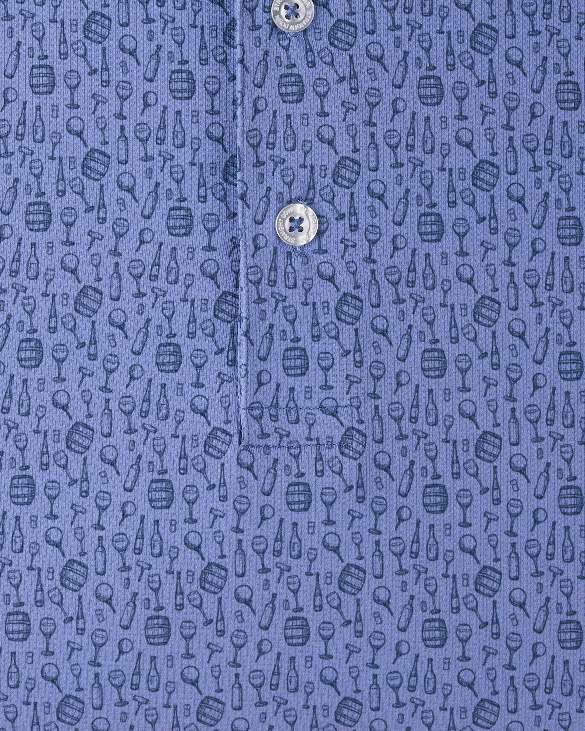 Close-up of the Tannins & Tees Polo in Tidal Blue featuring an allover golf and wine-inspired print
