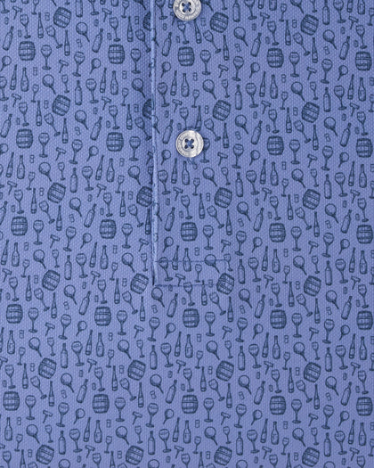 Close-up of the Tannins & Tees Polo in Tidal Blue featuring an allover golf and wine-inspired print