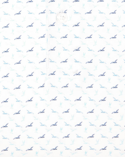 Men's Livingston Polo in White, close-up fabric detail view featuring an allover flying seagull print in navy, light blue, and mint tones on a white performance fabric
