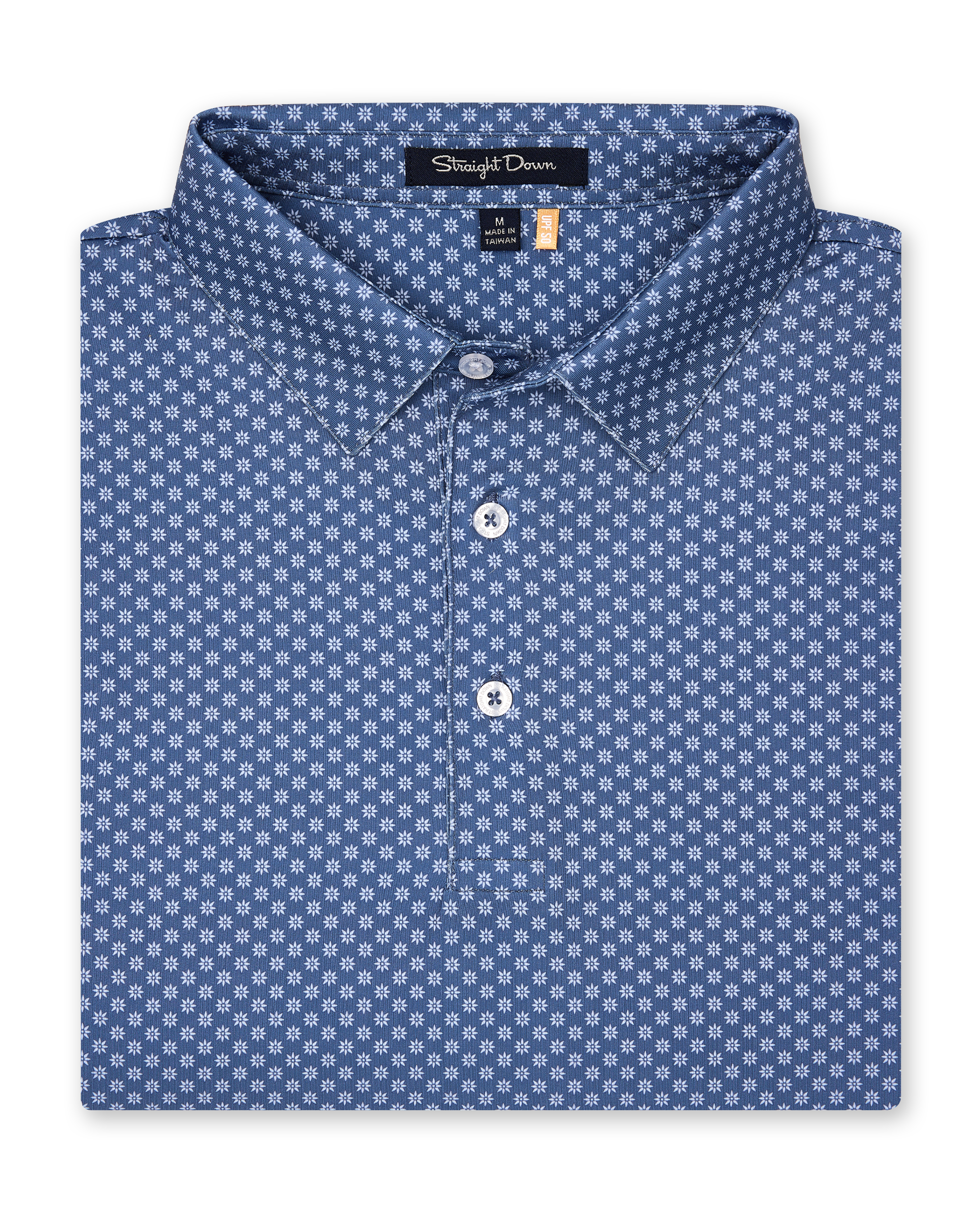 Folded blue Florian Polo showcasing geometric floral print and structured collar