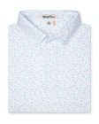 Men's Turtle Island Polo in Coastal, folded flat lay front view featuring a white short sleeve polo with an allover sea turtle and coral print in light blue and pink tones