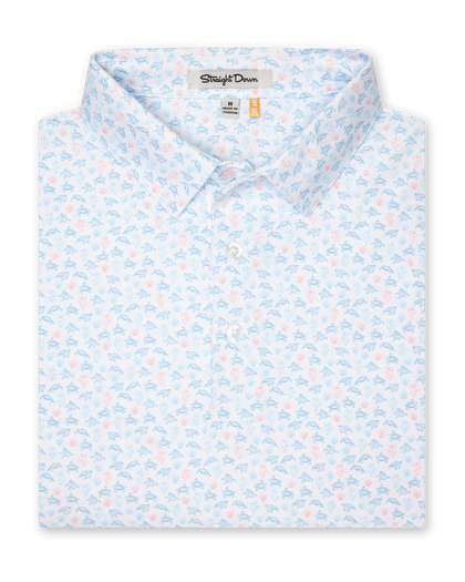 Men's Turtle Island Polo in Coastal, folded flat lay front view featuring a white short sleeve polo with an allover sea turtle and coral print in light blue and pink tones