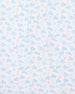 Men's Turtle Island Polo in Coastal, close-up fabric detail view featuring an allover sea turtle and coral print in light blue and pink tones on a white performance fabric