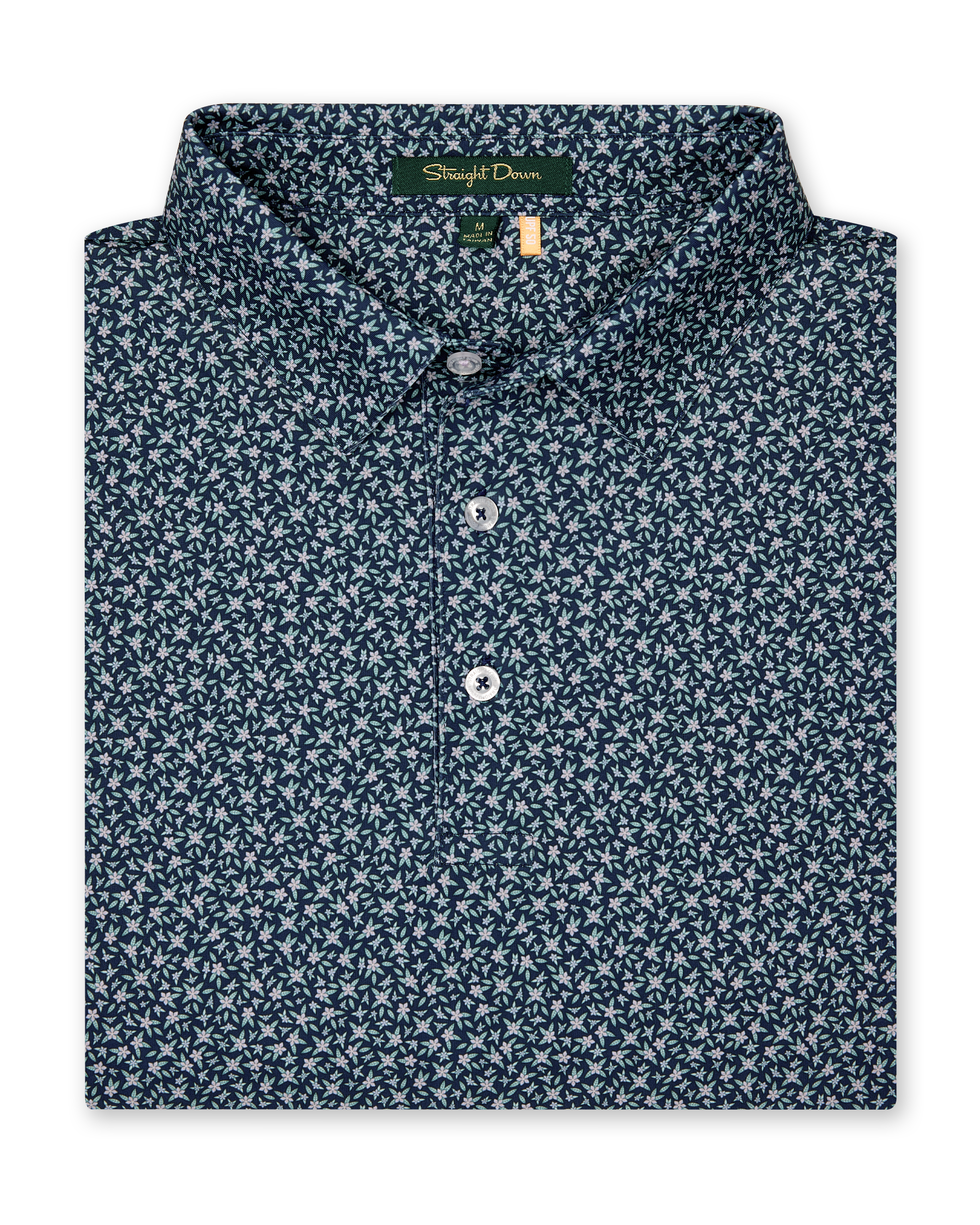 Men's Redbud Polo in New Indigo, folded flat lay front view featuring a navy base with a scattered green and light pink floral print