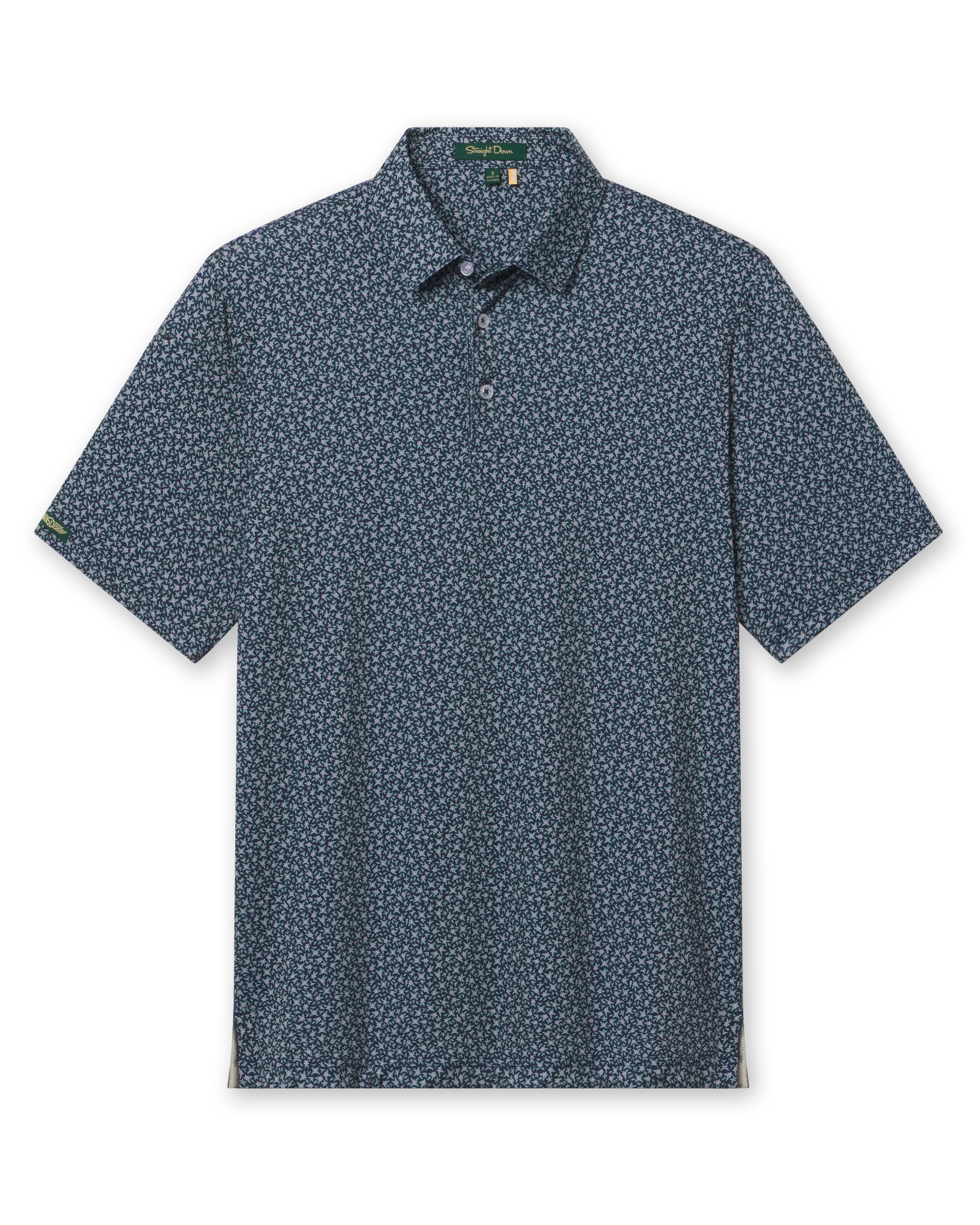 Men's Redbud Polo in New Indigo, flat lay front view featuring a navy base with a scattered green and light pink floral print and Straight Down sleeve tab