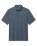 Men's Redbud Polo in New Indigo, flat lay front view featuring a navy base with a scattered green and light pink floral print and Straight Down sleeve tab