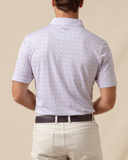 Back view of men’s chili pepper print polo with logo detail below the collar