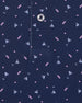 Close-up of navy polo fabric with martini print pattern