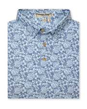 Men's Lihu'e Polo in Sea Spray, folded flat lay front view featuring a light blue short sleeve polo with an allover navy hibiscus flower and monstera leaf print, with a Straight Down Designed with Aloha label at the collar and natural wood-tone buttons