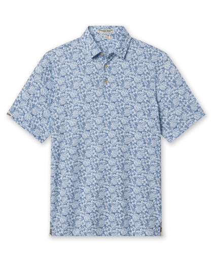 Men's Lihu'e Polo in Sea Spray, flat lay front view featuring a light blue short sleeve polo with an allover navy hibiscus flower and monstera leaf print