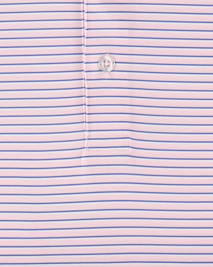 Close-up of the Channel Stripe Polo in Seashell, highlighting the fine blue stripe pattern, button, and placket construction.