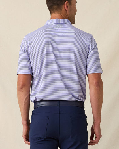 Men's Channel Stripe Polo in Violet, back model view featuring a lavender short sleeve polo with horizontal navy and white pencil stripes with the Straight Down logo at the back collar