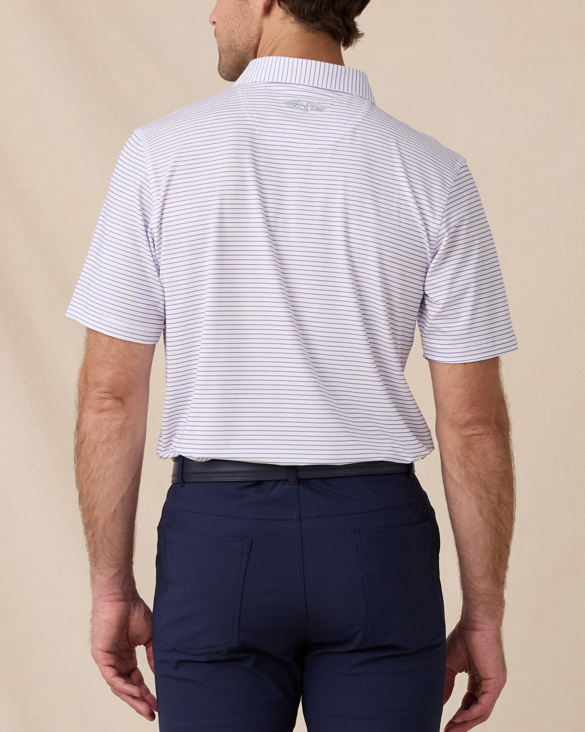 Back view of the Men's Channel Stripe Golf Polo in White with fine blue stripes and embroidered Straight Down logo below the collar.