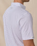 Close-up of the back shoulder on the Men's Channel Stripe Golf Polo in White, highlighting the embroidered Straight Down logo and fine stripe pattern.